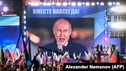 Президент России Владимир Путин выступает на митинге и концерте, посвящённом аннексии четырёх регионов Украины, оккупированных российскими войсками. Москва, 30 сентября 2022 года