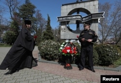 Церемония в память о затонувшем ракетном крейсере "Москва" в Севастополе 15 апреля.